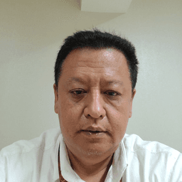 Simon PC Ngantung, S.E., M.H.